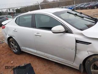 2015 Kia Optima LX with VIN KNAGM4A73F5646213, listed as a IAAI auction lot 41290553 with 101,415 mi miles. Bid and sale history available at carsss.com. Image 14.