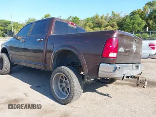 2015 Ram 1500 Big Horn with VIN 3C6RR7LT5FG597847, listed as a IAAI auction lot 42042971 with 212,541 mi miles and . Bid and sale history available at DreamBid. Image 3.