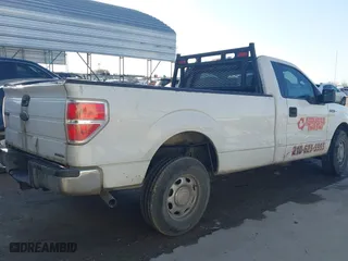 2014 Ford F-150 XL with VIN 1FTMF1CM4EKD68780, listed as a IAAI auction lot 41571968 with 193,363 mi miles. Bid and sale history available at carsss.com. Image 4.