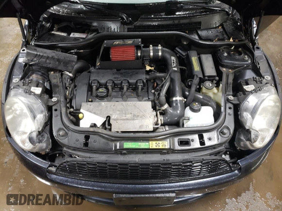 2007 MINI Hardtop S with VIN WMWMF73547TL90560, listed as a Copart auction lot 42565685 with 57,066 mi miles and Salvage Title. Bid and sale history available at DreamBid. Image 11.