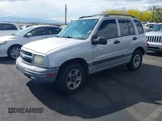 2002 Chevrolet Tracker z VIN 2CNBE13C426951703, wystawiony jako IAAI lot #42177942 z przebiegiem 186 096 mil mil oraz . Historia ofert i sprzedaży dostępna na DreamBid. Obrazek 2.