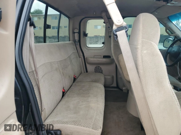 2000 Ford F-150 XL with VIN 1FTZX1721YNC09536, listed as a Copart auction lot 52645405 with 120,638 mi miles and Salvage Title. Bid and sale history available at carsss.com. Image 10.