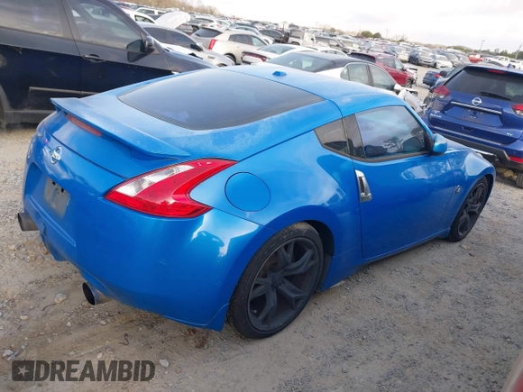 2009 Nissan 370Z Touring with VIN JN1AZ44E39M400201, listed as a IAAI auction lot 41710283 with 245,735 mi miles and . Bid and sale history available at DreamBid. Image 4.