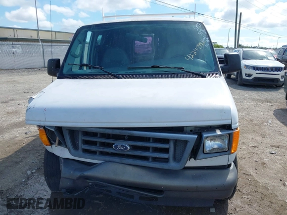 2006 Ford Econoline Cargo with VIN 1FTRE14W66HA95946, listed as a IAAI auction lot 42244992 with 230,184 mi miles and . Bid and sale history available at DreamBid. Image 6.
