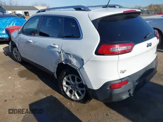 2015 Jeep Cherokee Latitude with VIN 1C4PJLCBXFW506502, listed as a IAAI auction lot 42103117 with 160,433 mi miles and . Bid and sale history available at carsss.com. Image 3.