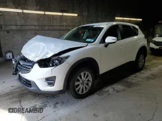 2016 Mazda CX-5 Sport z VIN JM3KE4BY2G0764082, wystawiony jako Copart lot #55756835 z przebiegiem 48 314 mil mil oraz Szkoda całkowita • Salvage title. Historia ofert i sprzedaży dostępna na DreamBid. Obrazek 1.