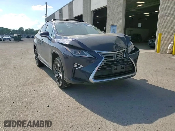 2018 Lexus RX 450h with VIN 2T2BGMCA9JC021481, listed as a Copart auction lot 57111405 with 186,533 mi miles and Salvage title. Bid and sale history available at DreamBid. Image 14.