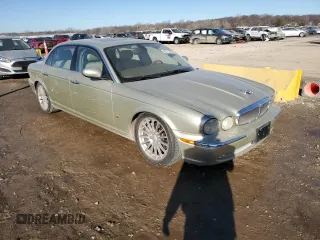 2006 Jaguar XJ with VIN SAJWA79B56SH01865, listed as a Copart auction lot 42511925 with 262,968 mi miles and Salvage Title. Bid and sale history available at carsss.com. Image 4.