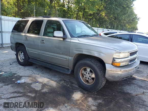 2000 Chevrolet Tahoe LS with VIN 1GNEK13T2YJ203710, listed as a Copart auction lot 57302495 with 237,227 mi miles and Salvage title. Bid and sale history available at DreamBid. Image 4.