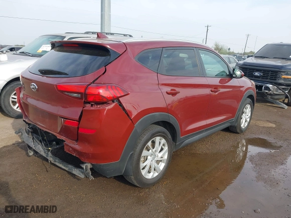 2019 Hyundai Tucson Value with VIN KM8J33A42KU861329, listed as a IAAI auction lot 41679185 with 65,304 mi miles. Bid and sale history available at carsss.com. Image 4.