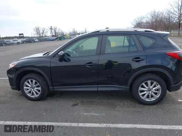 2016 Mazda CX-5 Sport with VIN JM3KE4BY7G0893578, listed as a IAAI auction lot 41853840 with 95,937 mi miles. Bid and sale history available at carsss.com. Image 14.