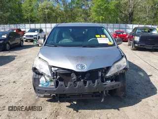 2014 Toyota Sienna LE AAS with VIN 5TDKK3DC4ES466642, listed as a IAAI auction lot 41978930 with 123,084 mi miles. Bid and sale history available at carsss.com. Image 6.