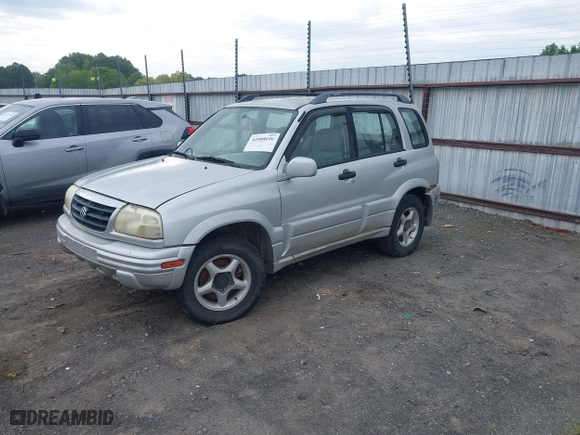 2000 Suzuki Grand Vitara JLX with VIN JS3TD62V5Y4117740, listed as a IAAI auction lot 42088696 with 166,484 mi miles. Bid and sale history available at carsss.com. Image 2.