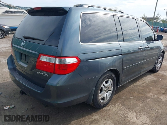 2005 Honda Odyssey EX-L with VIN 5FNRL38645B421253, listed as a IAAI auction lot 42106184 with 157,717 mi miles. Bid and sale history available at carsss.com. Image 4.