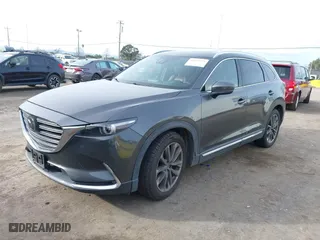 2016 Mazda CX-9 Signature with VIN JM3TCBEY7G0112486, listed as a IAAI auction lot 41592723 with 91,392 mi miles. Bid and sale history available at carsss.com. Image 2.
