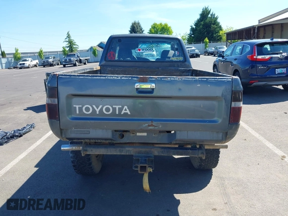1990 Toyota Pickup SR5 z VIN JT4VN13G7L5019822, wystawiony jako IAAI lot #42194555 z przebiegiem 255 628 mil mil oraz . Historia ofert i sprzedaży dostępna na DreamBid. Obrazek 17.