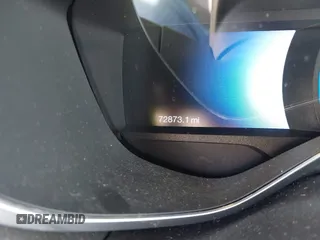 2014 Ford Focus Electric z VIN 1FADP3R41EL238035, wystawiony jako IAAI lot #41975546 z przebiegiem 72 873 mil mil oraz . Historia ofert i sprzedaży dostępna na DreamBid. Obrazek 7.