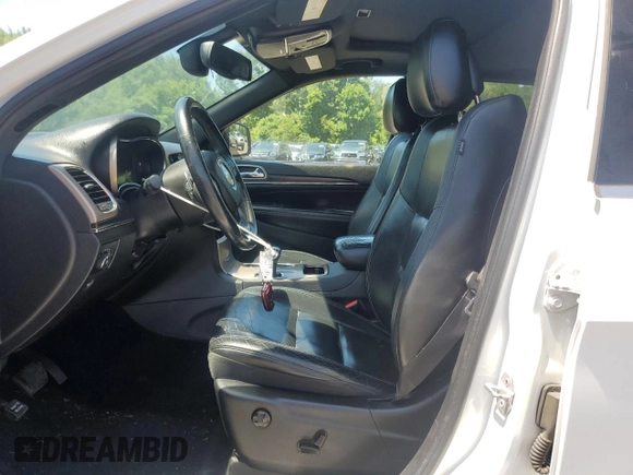 2014 Jeep Grand Cherokee Limited with VIN 1C4RJFBG0EC275410, listed as a Copart auction lot 62689055 with 169,925 mi miles and Clean title. Bid and sale history available at DreamBid. Image 7.