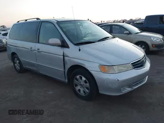 2004 Honda Odyssey EX-L z VIN 5FNRL18704B085905, wystawiony jako IAAI lot #41479953 z przebiegiem 189 371 mil mil oraz . Historia ofert i sprzedaży dostępna na DreamBid. Obrazek 1.