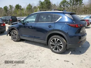 2022 Mazda CX-5 2.5 S Premium Package with VIN JM3KFBDMXN0559814, listed as a Copart auction lot 50985535 with 34,612 mi miles and Salvage Title. Bid and sale history available at carsss.com. Image 2.