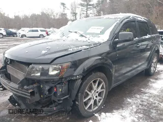 2015 Dodge Journey R/T with VIN 3C4PDDEG6FT655727, listed as a IAAI auction lot 41564080 with 158,585 mi miles and . Bid and sale history available at DreamBid. Image 2.