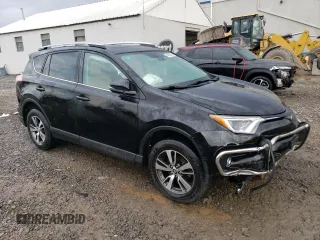 2018 Toyota RAV4 XLE with VIN 2T3RFREV6JW735352, listed as a Copart auction lot 46938025 with 73,229 mi miles and Salvage title. Bid and sale history available at DreamBid. Image 4.