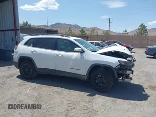 2019 Jeep Cherokee Latitude z VIN 1C4PJMCB0KD161976, wystawiony jako IAAI lot #42510314 z przebiegiem 256 990 mil mil oraz . Historia ofert i sprzedaży dostępna na DreamBid. Obrazek 13.
