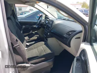 2016 Dodge Grand Caravan SE with VIN 2C4RDGBGXGR220549, listed as a IAAI auction lot 42074110 with 114,826 mi miles and . Bid and sale history available at DreamBid. Image 5.
