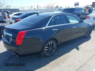 2014 Cadillac CTS RWD with VIN 1G6AP5SX0E0126103, listed as a IAAI auction lot 42160002 with 49,187 mi miles and . Bid and sale history available at DreamBid. Image 4.