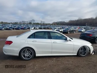 2014 Mercedes-Benz E 550 Sport with VIN WDDHF9BB5EA949457, listed as a IAAI auction lot 41128583 with 99,248 mi miles and . Bid and sale history available at DreamBid. Image 13.