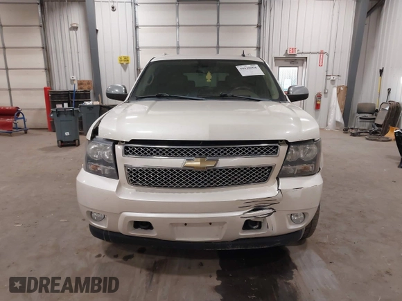 2010 Chevrolet Suburban LTZ with VIN 1GNUKKE31AR290571, listed as a IAAI auction lot 40948006 with 163,758 mi miles. Bid and sale history available at carsss.com. Image 11.