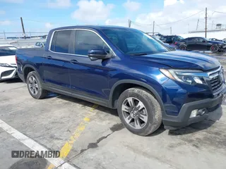 2017 Honda Ridgeline RTL-T with VIN 5FPYK2F68HB001759, listed as a IAAI auction lot 41562343 with 59,633 mi miles and . Bid and sale history available at DreamBid. Image 1.