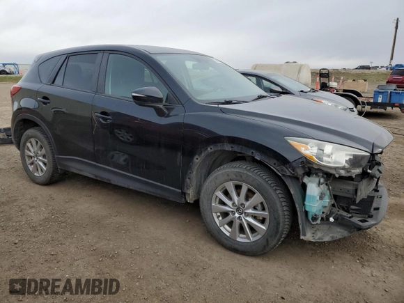 2016 Mazda CX-5 Touring with VIN JM3KE4CY8G0610653, listed as a Copart auction lot 53390375 with 125,142 mi miles and Salvage Title. Bid and sale history available at carsss.com. Image 4.