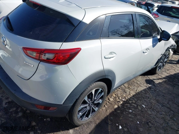 2019 Mazda CX-3 Touring with VIN JM1DKDC70K1406403, listed as a IAAI auction lot 41719684 with 119,602 mi miles. Bid and sale history available at carsss.com. Image 4.
