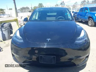 2020 Tesla Model Y Long Range with VIN 5YJYGDEE2LF059177, listed as a IAAI auction lot 41916260 with 66,190 mi miles and . Bid and sale history available at DreamBid. Image 12.