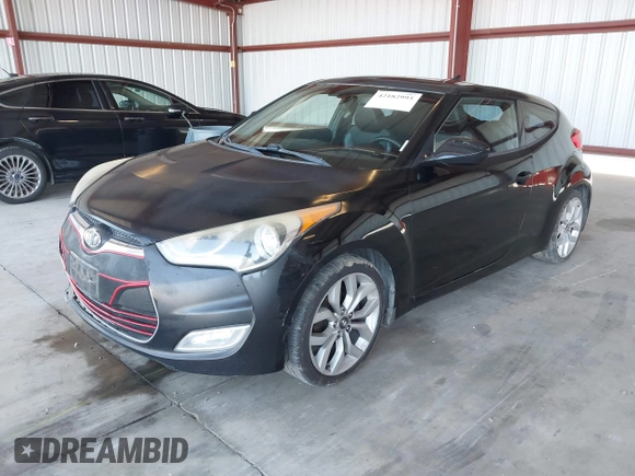 2012 Hyundai Veloster w/Gray Int z VIN KMHTC6AD0CU062046, wystawiony jako IAAI lot #42182993 z przebiegiem 148 574 mil mil oraz . Historia ofert i sprzedaży dostępna na DreamBid. Obrazek 2.