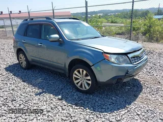 2012 Subaru Forester X Premium z VIN JF2SHADC3CH440877, wystawiony jako IAAI lot #42822325 z przebiegiem 142 392 mil mil oraz . Historia ofert i sprzedaży dostępna na DreamBid. Obrazek 1.