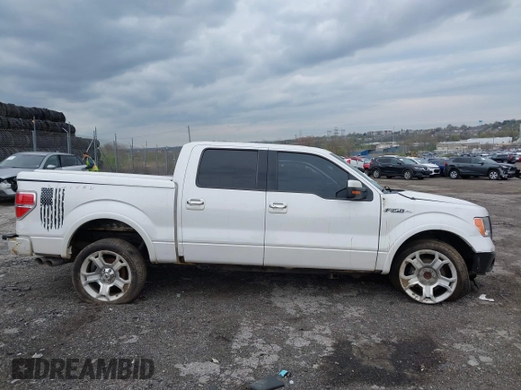 2011 Ford F-150 Lariat with VIN 1FTFW1E63BFB80098, listed as a IAAI auction lot 42038087 with 243,992 mi miles. Bid and sale history available at carsss.com. Image 14.