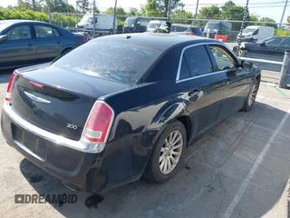 2014 Chrysler 300 with VIN 2C3CCAAG4EH252864, listed as a IAAI auction lot 42056787 with 185,063 mi miles. Bid and sale history available at carsss.com. Image 4.
