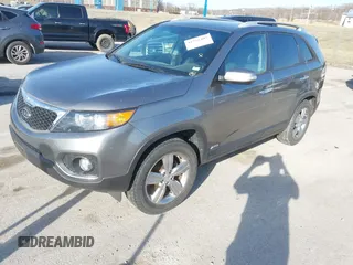 2012 Kia Sorento EX with VIN 5XYKUCA63CG300289, listed as a IAAI auction lot 41751407 with 141,310 mi miles. Bid and sale history available at carsss.com. Image 2.