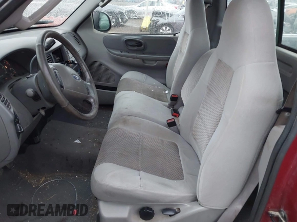 2003 Ford F-150 XL with VIN 1FTRF17223NB56888, listed as a IAAI auction lot 41151887 with Not Provided miles and . Bid and sale history available at DreamBid. Image 8.