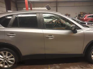 2014 Mazda CX-5 Grand Touring with VIN JM3KE4DY5E0305882, listed as a IAAI auction lot 41879532 with 173,443 mi miles. Bid and sale history available at carsss.com. Image 13.