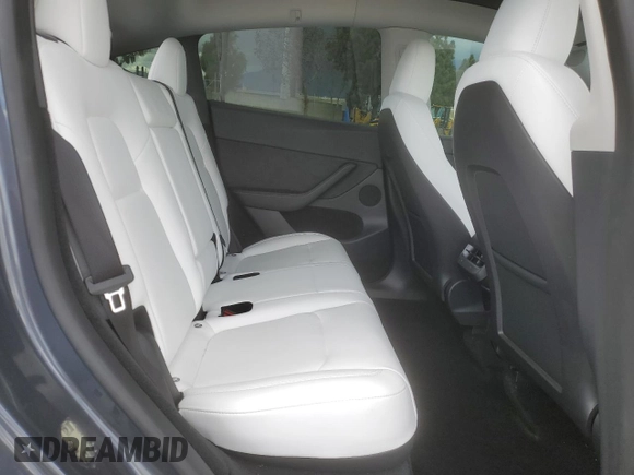 2023 Tesla Model Y Long Range z VIN 7SAYGDEE3PF916132, wystawiony jako Copart lot #51645625 z przebiegiem 28 238 mil mil oraz Szkoda całkowita • Salvage title. Historia ofert i sprzedaży dostępna na DreamBid. Obrazek 11.