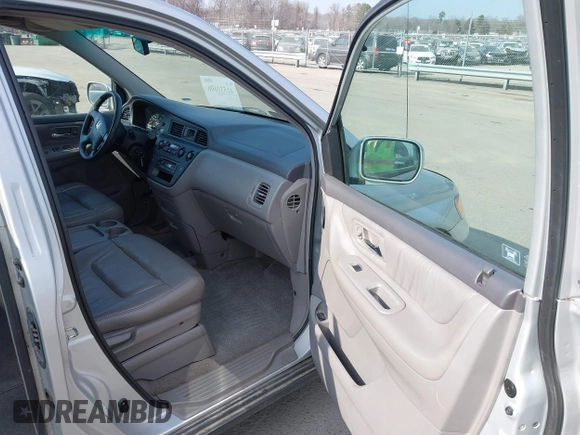 2004 Honda Odyssey EX-L with VIN 5FNRL18964B125664, listed as a IAAI auction lot 41531606 with 327,493 mi miles and . Bid and sale history available at DreamBid. Image 5.