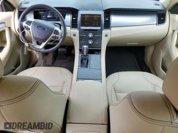 2015 Ford Taurus SEL with VIN 1FAHP2E89FG193926, listed as a Copart auction lot 61036375 with 23,963 mi miles and Salvage title. Bid and sale history available at DreamBid. Image 8.