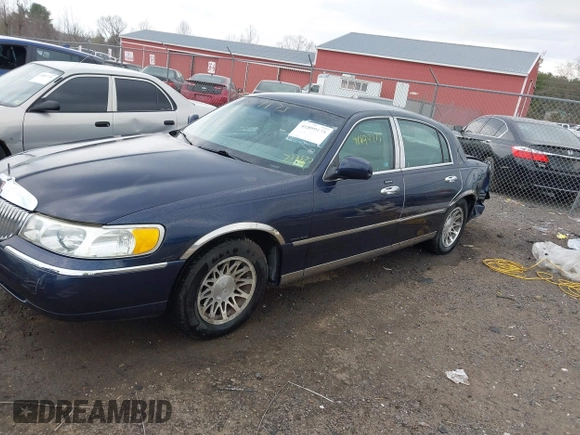 2001 Lincoln Town Car Signature with VIN 1LNHM82W61Y733577, listed as a IAAI auction lot 41899175 with 105,083 mi miles and . Bid and sale history available at DreamBid. Image 14.