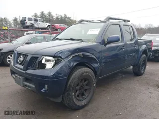 2011 Nissan Frontier PRO-4X with VIN 1N6AD0EV8BC435649, listed as a IAAI auction lot 41922791 with 203,928 mi miles. Bid and sale history available at carsss.com. Image 2.
