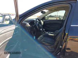 2015 Cadillac SRX with VIN 3GYFNAE30FS573125, listed as a IAAI auction lot 40972187 with 122,612 mi miles and . Bid and sale history available at DreamBid. Image 5.