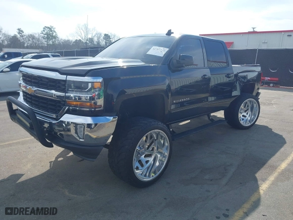 2016 Chevrolet Silverado 1500 LT with VIN 1GCRCREC1GZ374418, listed as a IAAI auction lot 41767741 with 123,632 mi miles. Bid and sale history available at carsss.com. Image 2.