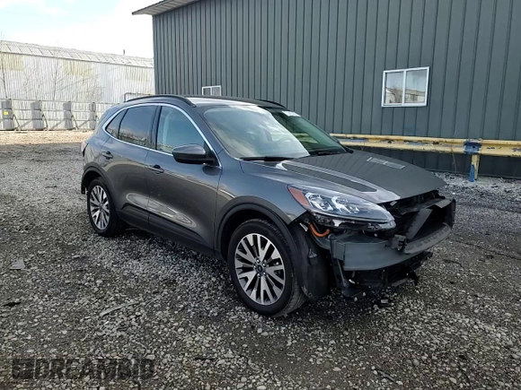 2021 Ford Escape Titanium Hybrid z VIN 1FMCU9DZ8MUA56194, wystawiony jako Copart lot #51427475 z przebiegiem 40 471 mil mil oraz Szkoda całkowita • Salvage title. Historia ofert i sprzedaży dostępna na DreamBid. Obrazek 11.